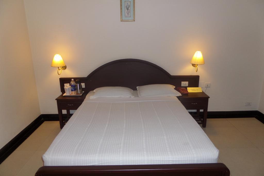 Hotel Elegance Kaladi Ruang foto